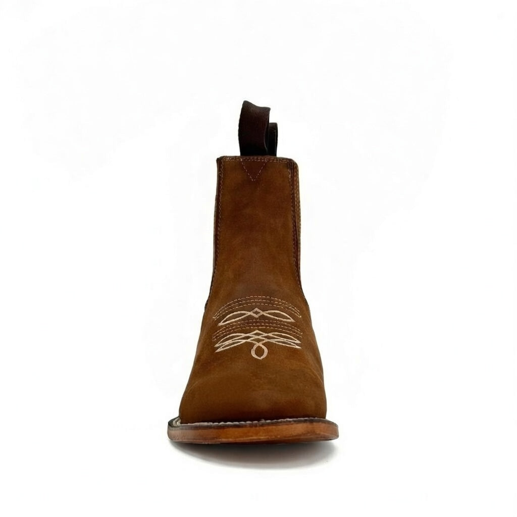 Botín vaquero para hombre de piel genuina, confección artesanal y suela de cuero